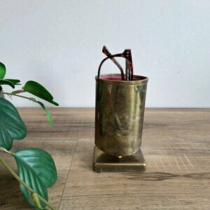 Vintage 1960s 1970s brass eye glasses or stationary holder on pedestal.